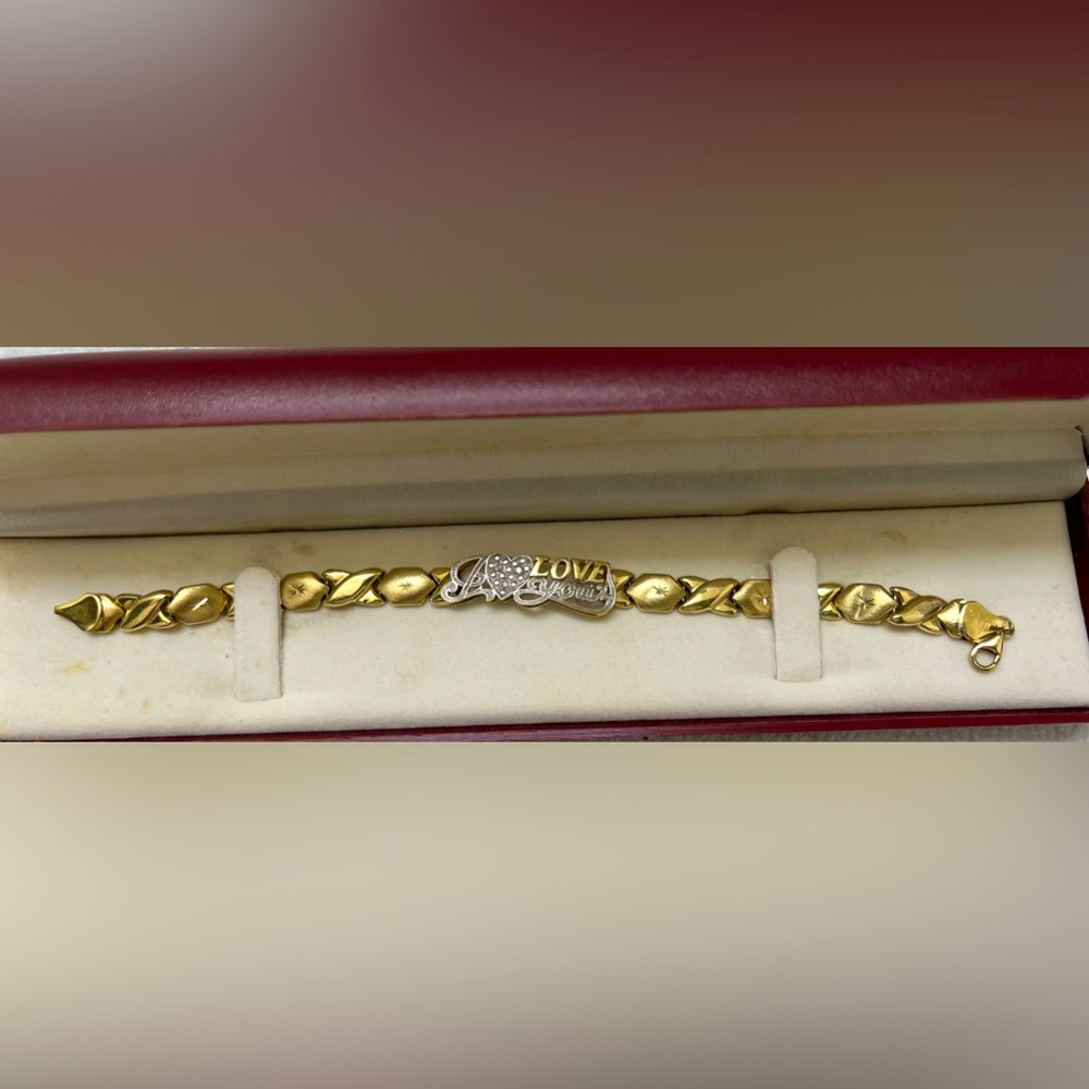 I LOVE YOU engraved designed bracelet in10k yellow gold.